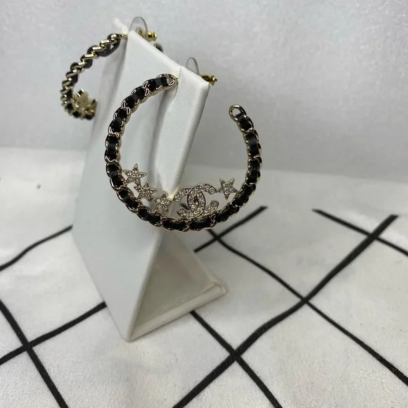 Chanel Black leather and stars Hoop Earrings - Picture 1 of 5